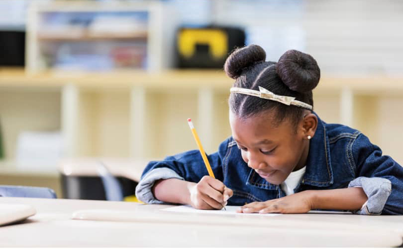 Young student writing